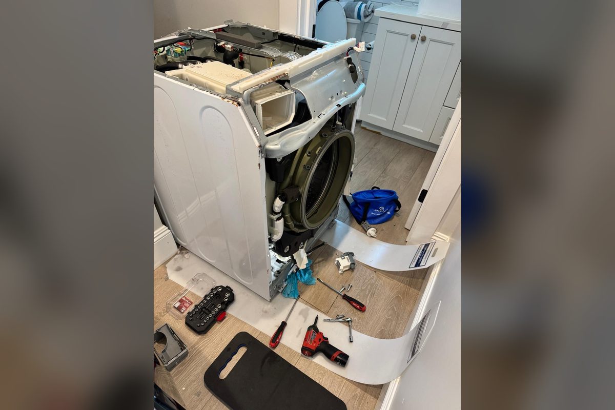 Front-load washer taken apart for repair by Appliance Repair Indio, CA